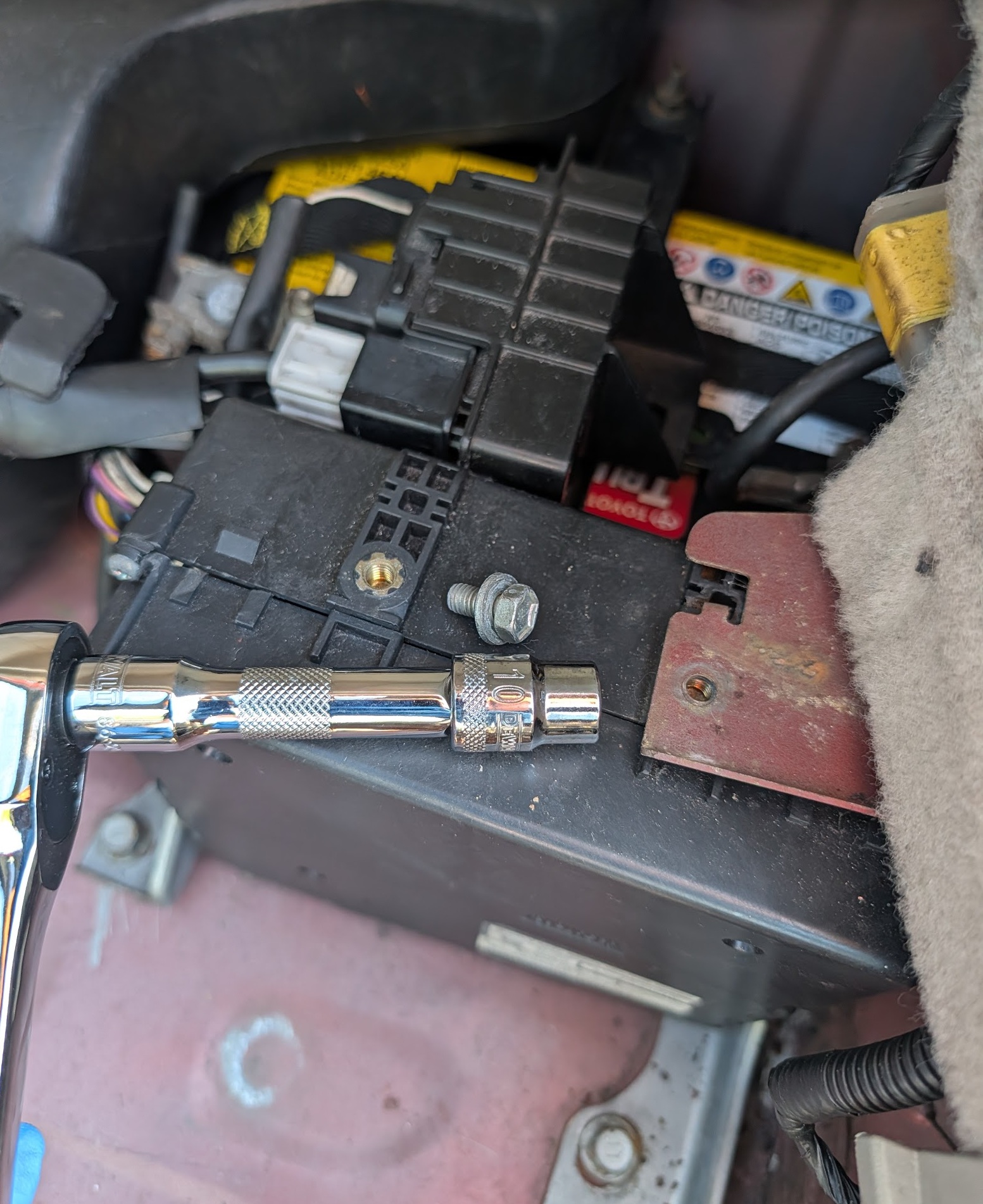 10mm socket and removed negative terminal clamp bolt
