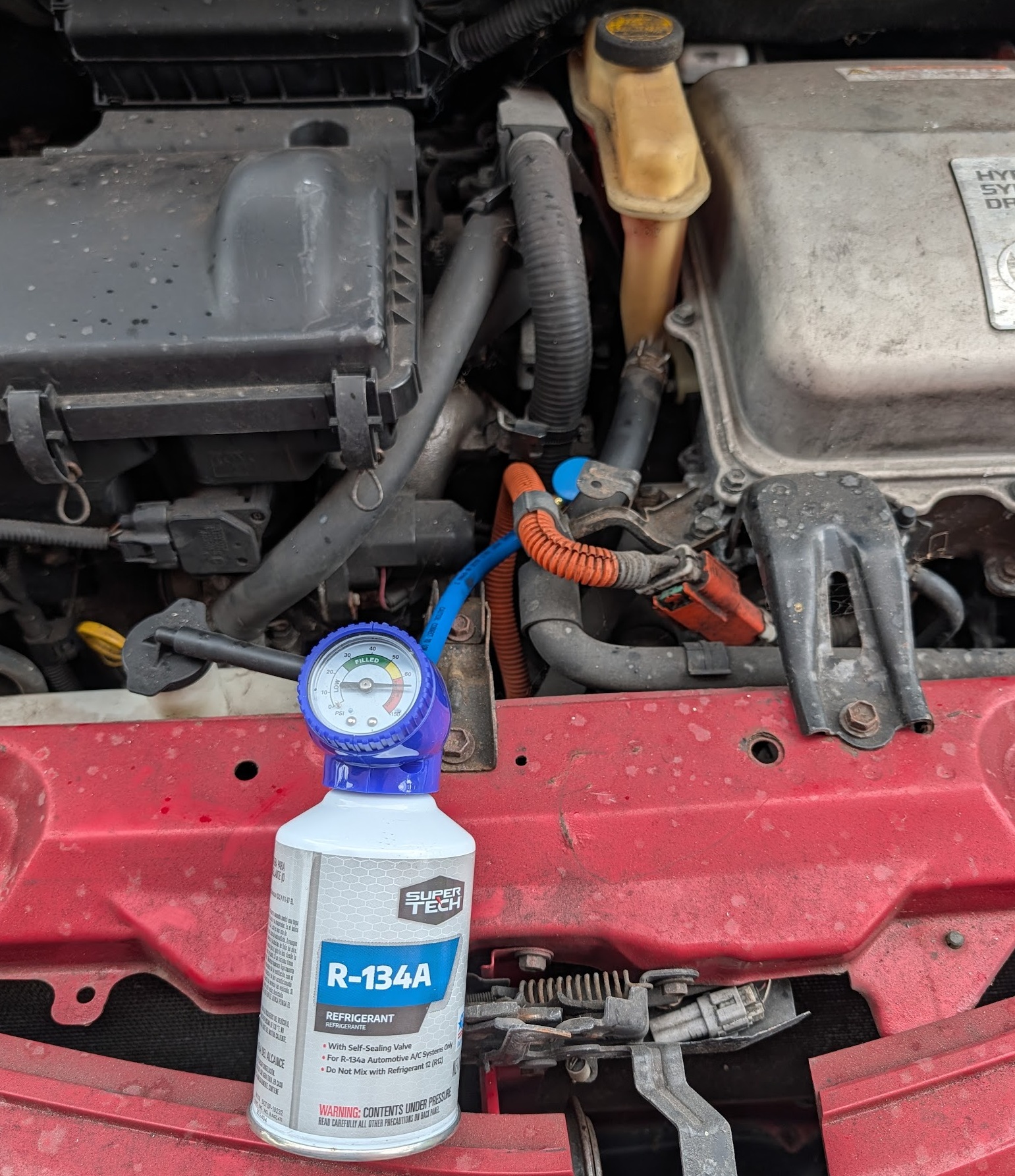 Gen 2 Prius dashboard showing car is off before connecting AC recharge hose